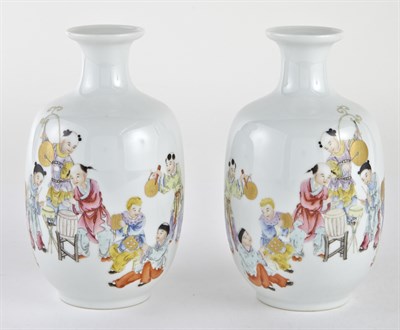 Lot 43 - A Pair of Chinese Enameled Porcelain 'Boys'...