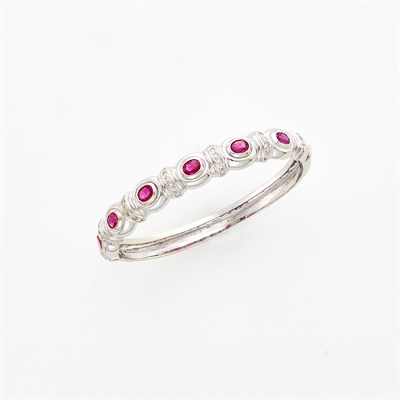 Lot 121 - White Gold, Ruby and Diamond Bangle Bracelet