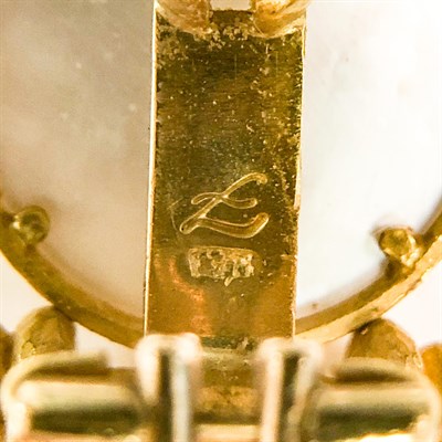Lot 136 - Elizabeth Locke Pair of Hammered Gold, Venetian White Glass Cameo, Mother-of-Pearl and Moonstone Earclips