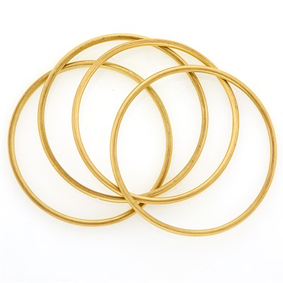 Lot 223 - Four Gold Bangle Bracelets