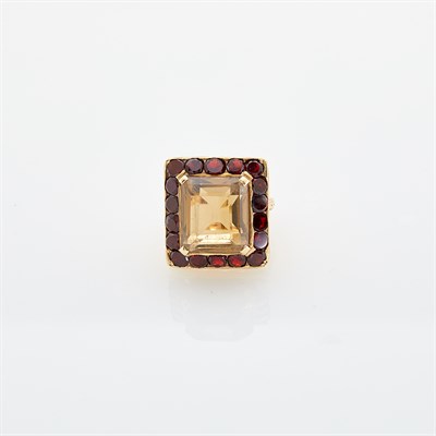Lot 89 - Gold, Smoky Quartz and Garnet Ring