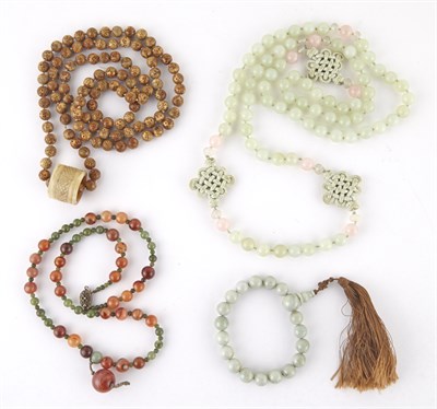 Lot 238 - Four Chinese Hardstone Buddhistic Beaded...