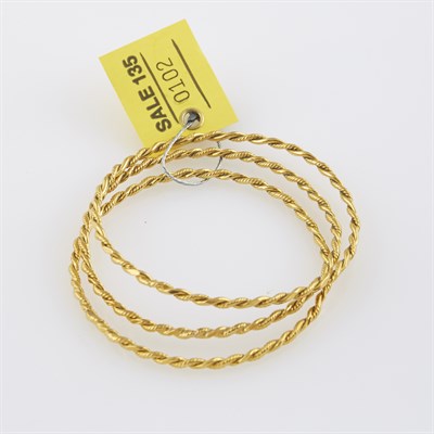 Lot 102 - Three Gold Rigid Bracelets, 22K 21 dwt.