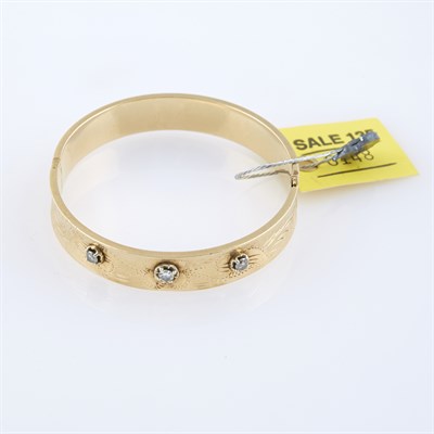 Lot 148 - Diamond Rigid Bracelet, 3 diamonds about 0.45...