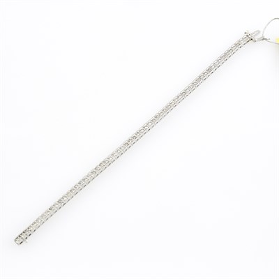 Lot 348 - Diamond Tennis Bracelet, 60 diamonds about...