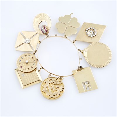 Lot 557 - Gold Rigid Bracelet with 8 diamond, bead and...