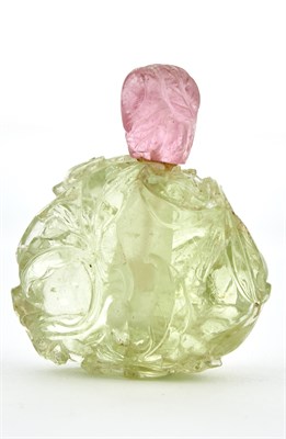 Lot 47 - A Chinese Carved Pale Green Tourmaline 'Peach'...