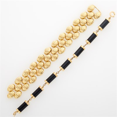Lot 1088 - Three Row Gold Bracelet and Gold and Black Onyx Cylinder Link Bracelet