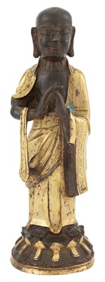 Lot 245 - A Chinese Gilt Bronze Figure of a Luohan The...