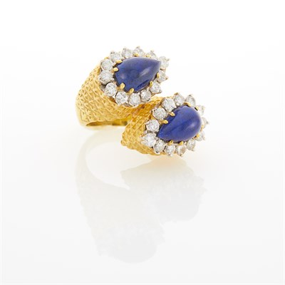 Lot 1103 - Two-Color Gold, Lapis and Diamond Bypass Ring