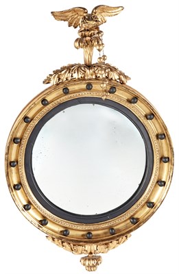 Lot 141 - Classical Giltwood and Part Ebonized Convex Mirror