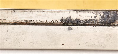 Lot 328 - Tiffany & Co. Sterling Silver, 14 K Yellow...