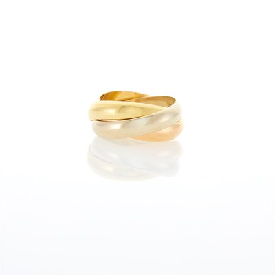 Lot 1084 - Cartier Tricolor Gold 'Trinity' Rolling Band Ring