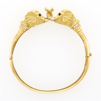 Lot 1009 - Gold, Diamond and Black Onyx Elephant Bangle Bracelet, France