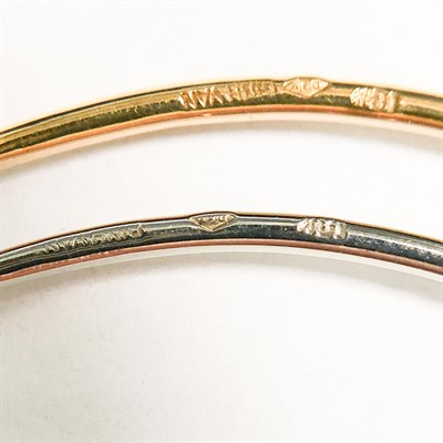 Lot 155 - Dinh Van Three Yellow, White and Rose Gold and Diamond 'Serrure' Bracelets