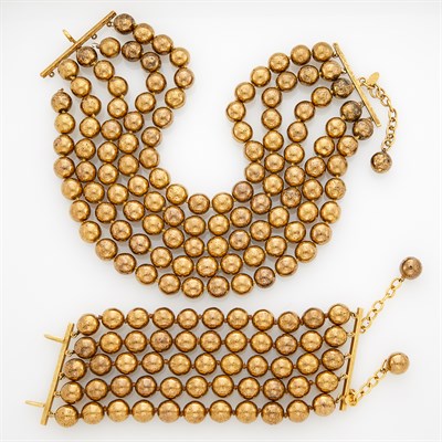 Lot 250 - Chanel Five-Strand Gilt-Metal Bead Necklace and Bracelet