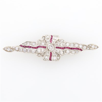 Lot 1051 - White Gold, Diamond and Ruby Bow Brooch