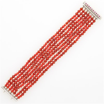 Lot 67 - Seven Strand Coral and Carnelian Bead Bracelet with White Gold and Synthetic Ruby Clasp