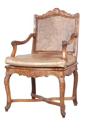 Lot 44 - Régence Walnut and Beechwood Fauteuil à la...