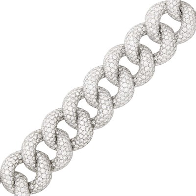 Lot 100 - Seaman Schepps White Gold and Diamond Curb Link Bracelet
