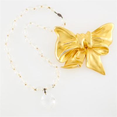 Lot 1252 - Quartz Pendant Necklace and Oversized Gilt-Metal Bow Belt Buckle