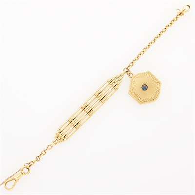 Lot 1166 - Gold Bracelet Fob with Gold and Cabochon Sapphire Locket