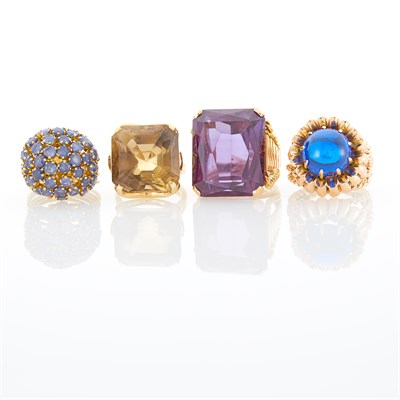 Lot 1141 - Four Gold, Sapphire, Smoky Quartz and Simulated Stone Rings