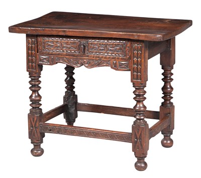 Lot 577 - Continental Walnut Side Table The rectangular...