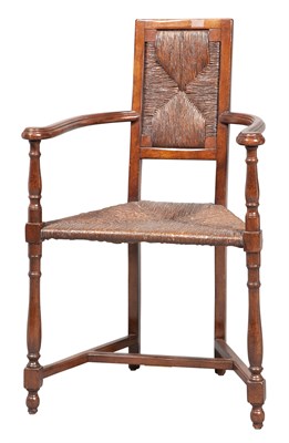 Lot 281 - Stained Beechwood and Rush Seat Armchair By...