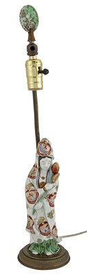 Lot 306 - A Japanese Enameled Porcelain Figure of Kannon...