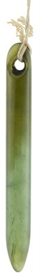 Lot 133 - An Archaic Chinese Translucent Green Jade...