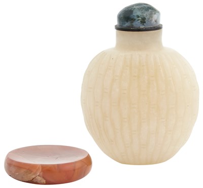 Lot 16 - A Chinese White Jade Snuff Bottle 19th Century...