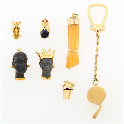 Lot 229 - Group of Gold Charms and Tie Tacs