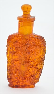 Lot 2 - A Chinese Amber Snuff Bottle Carved in the...