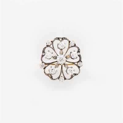 Lot 1068 - Antique Silver-Topped Gold and Diamond Flower Brooch