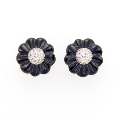 Lot 60 - Pair of White Gold, Carved Black Onyx and Diamond Flower Earclips