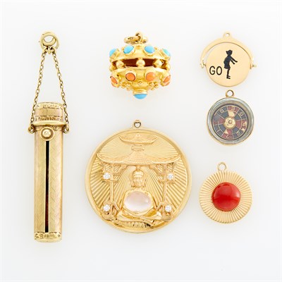 Lot 223 - Five Gold Charms and Tiffany & Co. Gold Lipstick Case