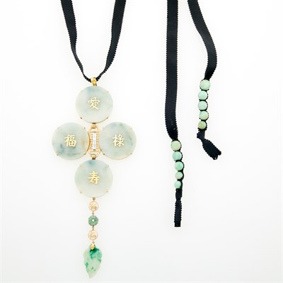 Lot 235 - Oversized Gold and Jade Pendant with Black Grosgrain Ribbon