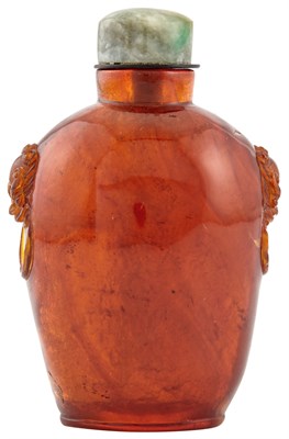 Lot 17 - A Chinese Carved Amber Snuff Bottle Late Qing...