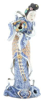 Lot 292 - A Chinese Enameled Porcelain Figure of a...