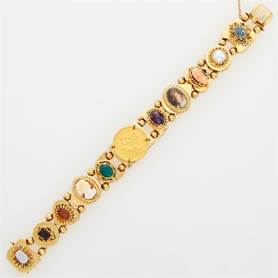Lot 173 - Gold and Gem-Set Charm Bracelet
