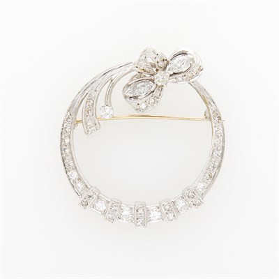 Lot 55 - Platinum and Diamond Circle Bow Brooch