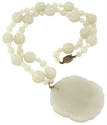 Lot 47 - A Chinese White Jade Pendant and Beaded...