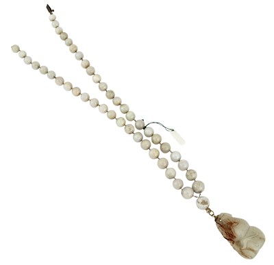 Lot 44 - A Chinese White Jade Pendant and Beaded...