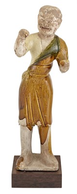 Lot 193 - A Chinese Sancai Glazed Pottery Figure of a...