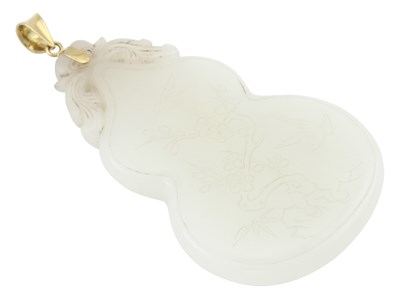 Lot 59 - A Chinese Carved White Jade Pendant Qing...