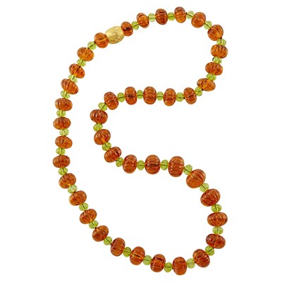 Lot 1234 - Fluted Citrine and Peridot Bead Necklace with Gold and Diamond Clasp