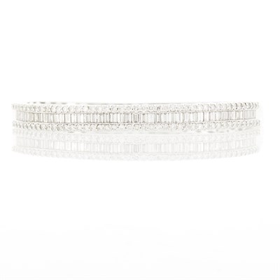 Lot 1192 - White Gold and Diamond Bangle Bracelet