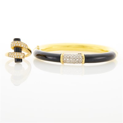 Lot 1030 - Gold, Black Enamel and Diamond Bangle Bracelet and Gold, Diamond and Black Onyx Ring