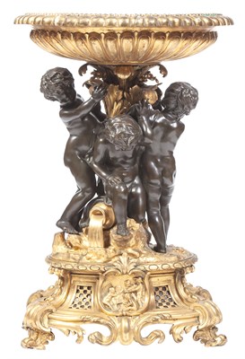 Lot 216 - Louis XVI Style Gilt and Patinated Metal...